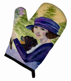 Lady driving with her Pomeranian Oven Mitt